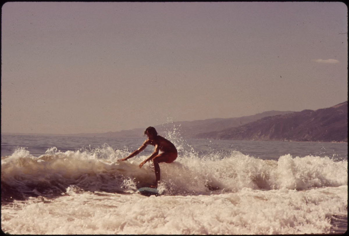 A surfer riding a wave at Malibu in October 1972, from the EPA's Documerica project